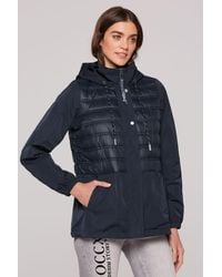 SOCCX - Outdoorjacke Windjacke mit im Materialmix in Blue (1-St) Kapuze - Lyst