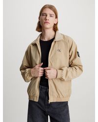 Calvin Klein - Jeans Outdoorjacke UNPADDED HARRINGTON mit Calvin Klein Logo-Badge - Lyst