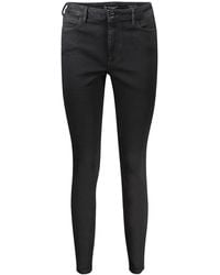 Guess - GUESS 5-Pocket- -Jeans Skinny High Schwarz: Nachhaltige Denim-Hose mit Logo - Lyst