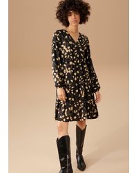 Aniston CASUAL - Blusenkleid mit graphischem Blumendruck - Lyst