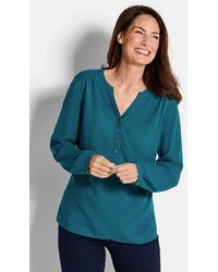 Goldner - Schlupfbluse Kurzgröße: Elegante Viskosebluse Mit V-Ausschnitt Luftige Bluse Mit Fältchen, Knopfleiste Und Langarm - Lyst