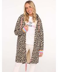 Zwillingsherz - Jerseymantel "Leo allover Neon Kante" mit Kapuze und Taschen, Neondetails - Lyst