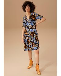Aniston CASUAL - Jerseykleid mit graphischem Blumendruck - Lyst
