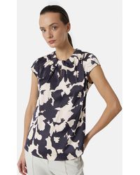 Comma, - Kurzarmbluse Gemusterte Satin-Bluse mit Raffung - Lyst