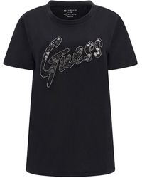Guess - T-Shirt mit Strass-Logo - Lyst
