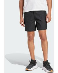 adidas - CITY ESCAPE WOVEN SHORTS - Lyst