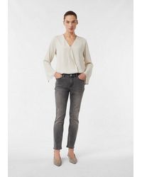 Comma, - Slim-Fit-Jeans Jeans-Hose Elastische Slim-Fit-Jeans Mit Schmuckknopf - Lyst
