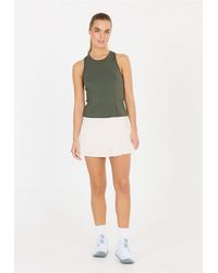 Athlecia - A-Linien-Rock Biny im cleveren 2-in-1 Design mit integrierter Tights - Lyst