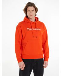 Calvin Klein - Kapuzensweatshirt HERO LOGO COMFORT HOODIE mit Logoschriftzug - Lyst