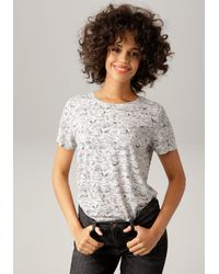Aniston CASUAL T-Shirt bunte, leicht glänzende Applikation mit Flamingos in  Schwarz | Lyst DE