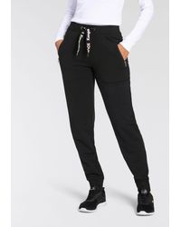 Kangaroos - Jogger Pants Sweatpants mit Zippertaschen und Logo String - Lyst