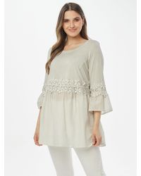 Body Needs - Tunika Longbluse Figurumspielend mit Blütenband - Lyst