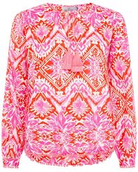Zwillingsherz - Shirtbluse "Tröpfchen" mit auffallendem Muster, Tasseln und Pom Besatz - Lyst