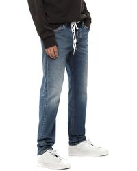 DIESEL - Fit- Larkee-Beex 084TU Jeans Hose Regular Tapered - Lyst