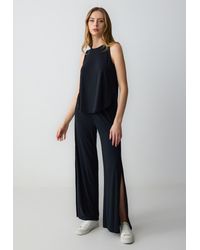 Jimmy Key - Relaxed Fit Strickhose mit weitem Bein Schlitzen und hoher Taille - Lyst