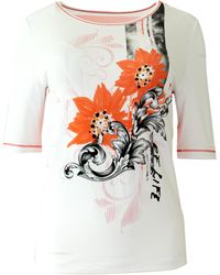 Passioni - Print- T-Shirt Blumenprint und Nieten Details mit Streifen am Rücken - Lyst