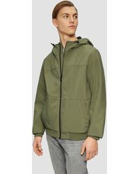 QS - Allwetterjacke Softshelljacke mit Kapuze und Rippbündchen Teilungsnaht - Lyst