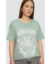 QS - Kurzarmshirt Baumwollshirt mit Frontprint und überschnittener Schulter - Lyst