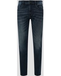 QS - Stoffhose Jeans Rick / Fit / Mid Rise / Slim Leg Waschung, Label-Patch, Destroyes - Lyst