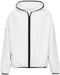 Trigema - Sweatjacke Dünne Kapuzenjacke mit praktischen Taschen (1-tlg) - Lyst