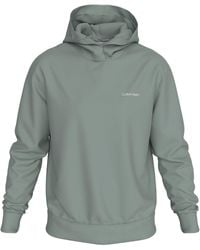 Calvin Klein - Kapuzensweatshirt ENLARGED BACK LOGO HOODIE mit Logodruck - Lyst
