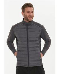 Endurance - Laufjacke MIDAN mit wärmenden Steppeinsätzen - Lyst