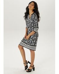 Aniston SELECTED - Jerseykleid mit femininen Ethno-Muster Allover - Lyst