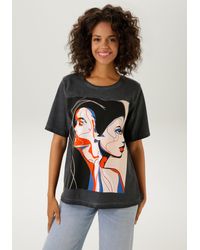 Aniston CASUAL - T-Shirt mit kunstvoll gestalteten Gesichtern bedruckt - Lyst