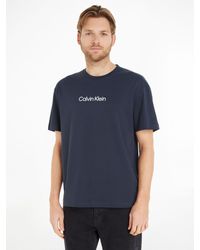 Calvin Klein - HERO LOGO COMFORT T-SHIRT mit aufgedrucktem Markenlabel - Lyst