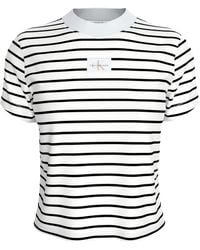 Calvin Klein - T-Shirt WOVEN LABEL RIB BABY TEE mit Logopatch - Lyst