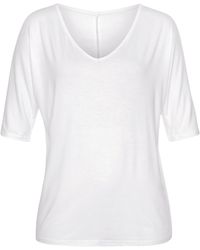 vivance active - T-Shirt Cut-outs am Ärmel, Kurzarmshirt mit V-Ausschnitt, casual - Lyst