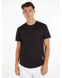Calvin Klein - T-Shirt BADGE TURN UP SLEEVE mit Logopatch - Lyst