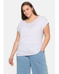 Sheego - T-Shirt Große Größen mit Alloverdruck und gelegten Falten - Lyst