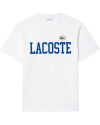 Lacoste - Kurzarmshirt T-Shirt Kontrastaufdruck mit 3-D-Krokodil-Patch - Lyst