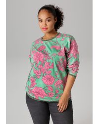 Aniston PLUS - Sweatshirt mit großflächigen, grafischen Blumen bedruckt - Lyst