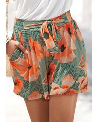 Lascana - Shorts aus Viskosejersey mit Alloverdruck und Taschen, kurze Hose, sommerlich - Lyst