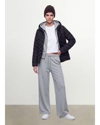 OVS - Giacca Ultralight Nera Trapuntata Con Cappuccio E Zip, Donna, Taglia - Lyst