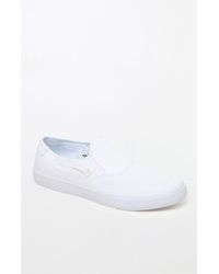 white nike slip on shoes