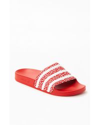 red and white adidas sandals