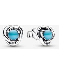PANDORA - December Birthstone Eternity Circle Stud Earrings - Lyst