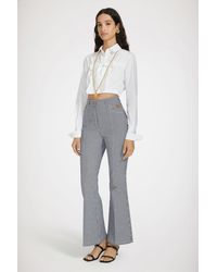 Patou - Flared Trousers - Lyst