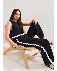 Phase Eight - Audrey Scallop Edge Jumpsuit - Lyst