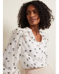 Phase Eight - Taytum Bow Print Blouse - Lyst