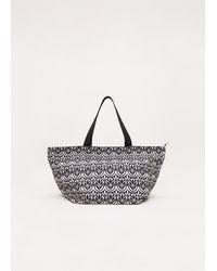 Phase Eight - Geo Printed Beach Bag - Lyst