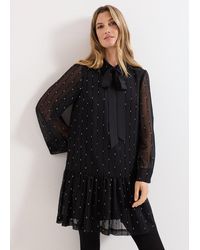 Phase Eight - Tessa Glitter Mini Swing Dress - Lyst