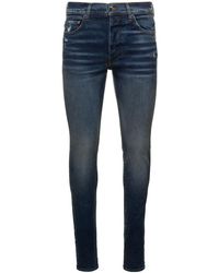 Amiri - E Skinny Jeans With Logo Patch In Stretch Cotton Denim Man - Lyst