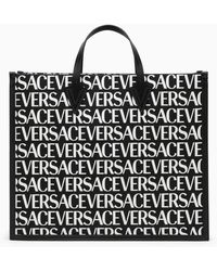 Versace - Black Tote Bag With All Over Logo - Lyst