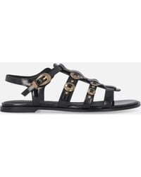 Pinko - Flat Sandals With Straps And Studs - Lyst