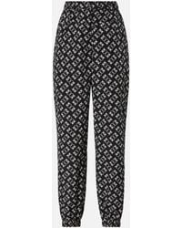 Pinko - Sporty Trousers With All-Over Love Birds Logo - Lyst