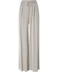Pinko - Flared Polka-Dot Satin Trousers - Lyst